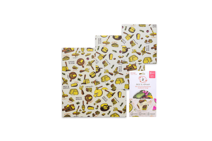 Three reusable beeswax wraps with Wheels n Wedges themed pattern, shown next to their white packaging on a solid white background.
